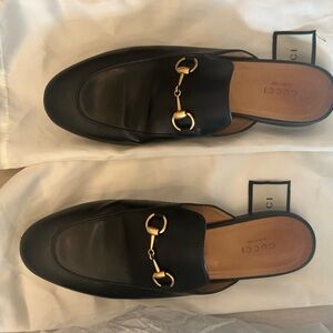 Gucci Black Leather Mules with Gold Hardware